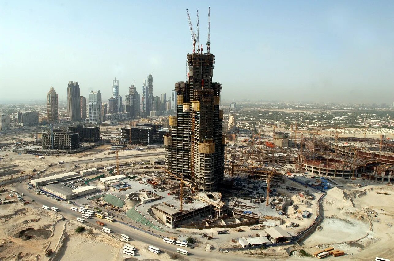 Самый большой город на земле. Бурдж Халифа Дубай строительство. Бурдж Халифа стройка. Бурдж Халифа 2005. Бурдж Халифа начало строительства.