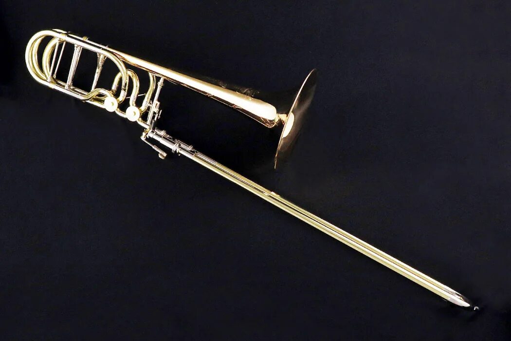 Кларнет тромбон. Holton 180 Bass Trombone. Тромбон музыкальный инструмент кларнет. Тромбон со-236-2. Сопрано тромбон.