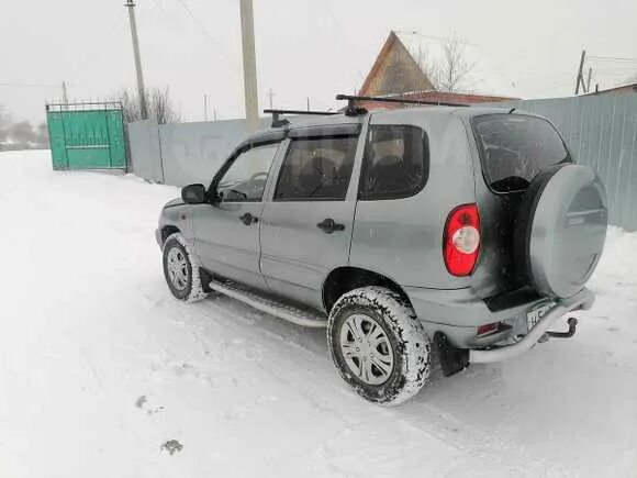 Нива Шевроле 2006г. Chevrolet Niva 2008 год зима дром. Фото багажника Шевроле Нива 2007 год 1.7 MT GLS 1 поколение. Купить ниву в Иркутске дром.