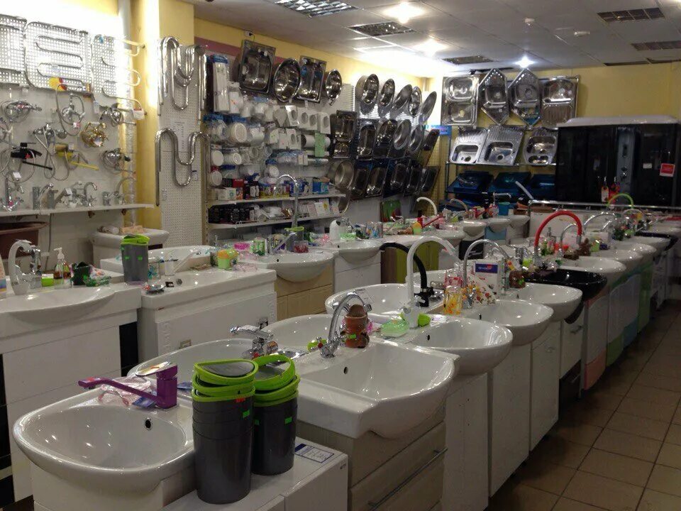 дмитровское шоссе 64к6. интерьер магазина сантехники. нептун дмитров сантехника. дистрибьюторы сантехнического и инженерного оборудования. выкладка в магазине сантехники.