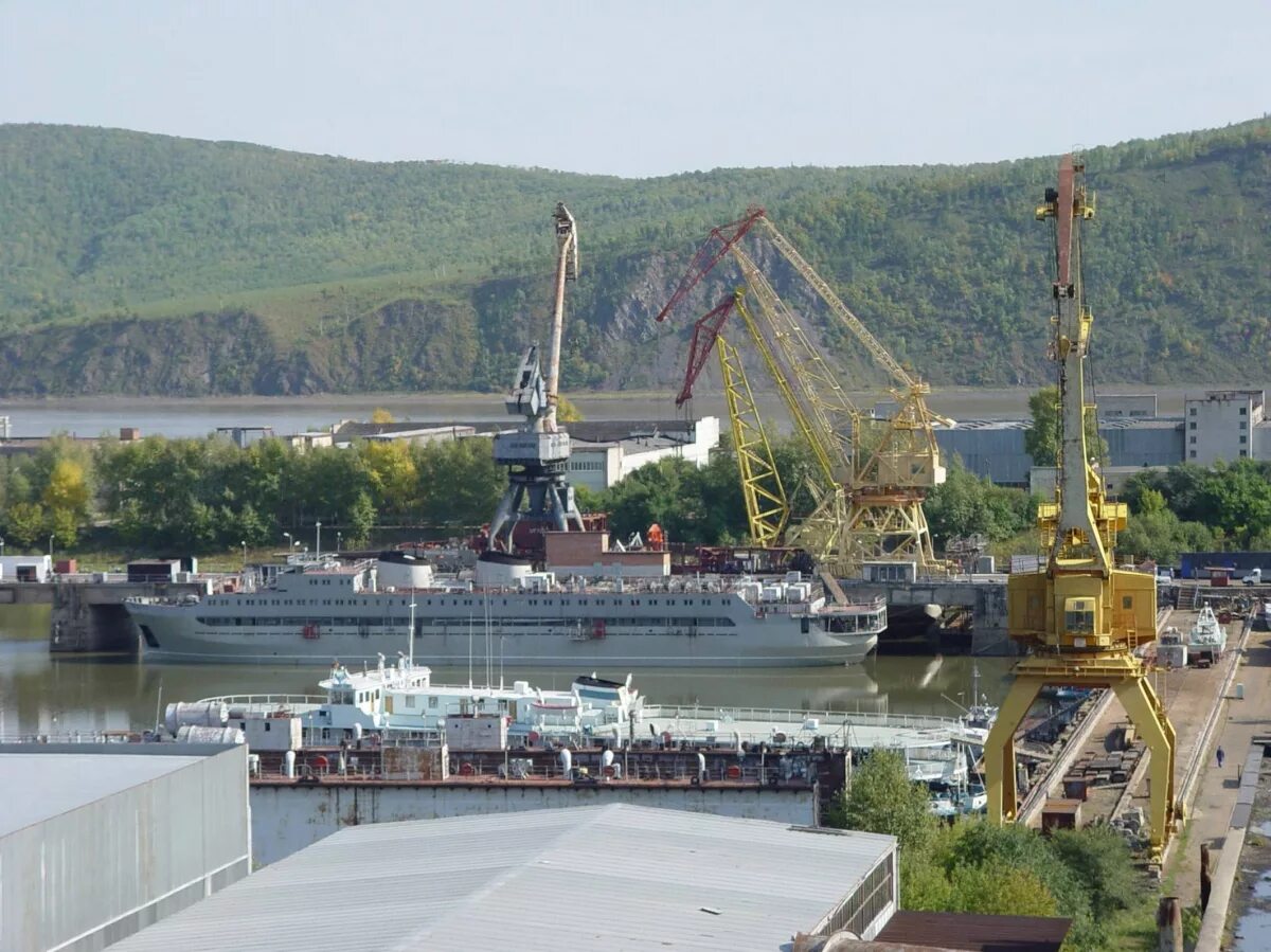 Пао комсомольск на амуре. Амурский судостроительный завод Комсомольск-на-Амуре. Комсомольский на Амуре судостроительный завод. Амурского судостроительного завода АСЗ. Судоремонтный завод Комсомольск на Амуре.