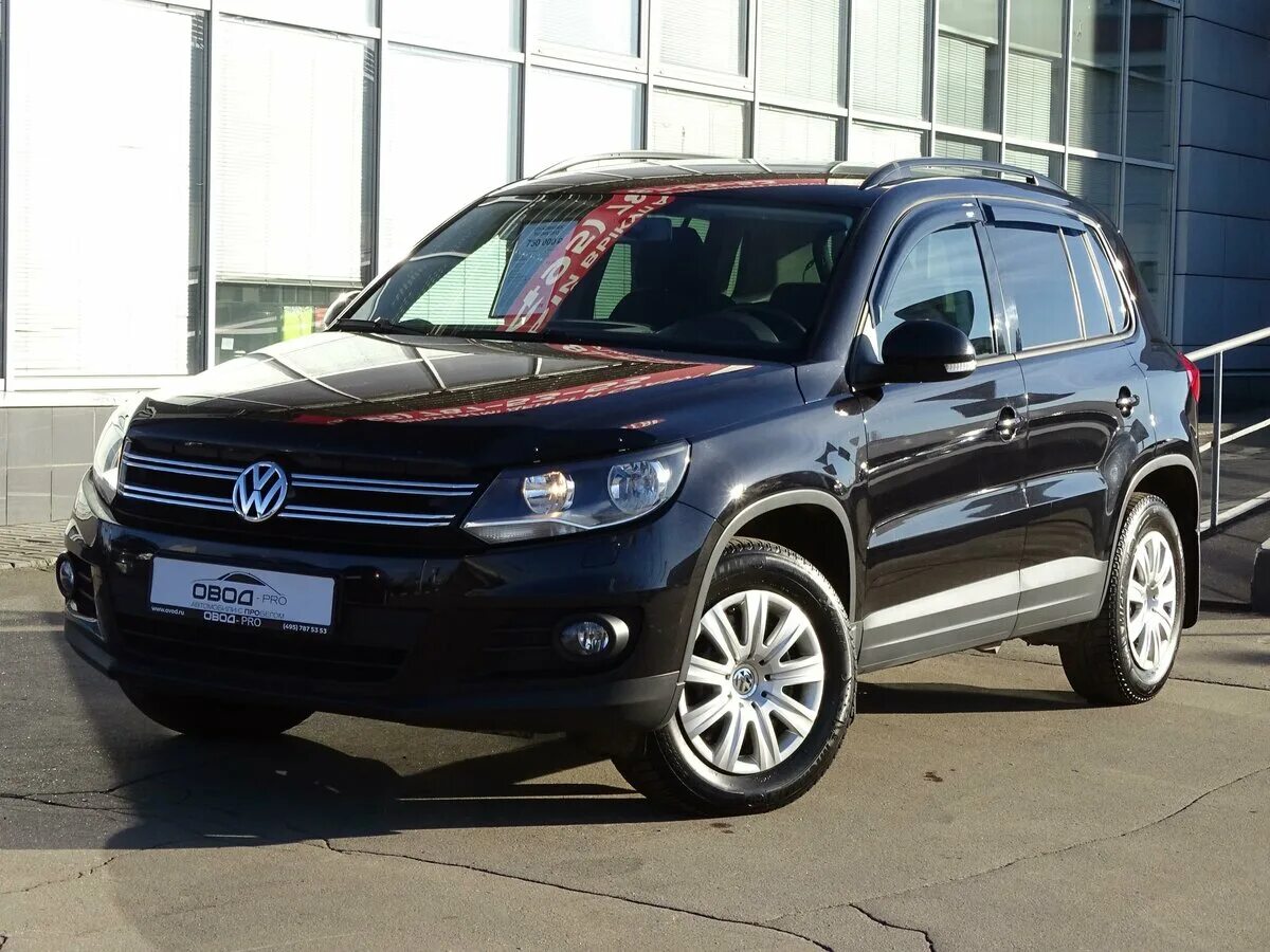 Сколько стоит volkswagen tiguan. Фольксваген Тигуан 2012 черный. Volkswagen Tiguan i. Volkswagen Tiguan i Рестайлинг. VW Tiguan 1 Рестайлинг.