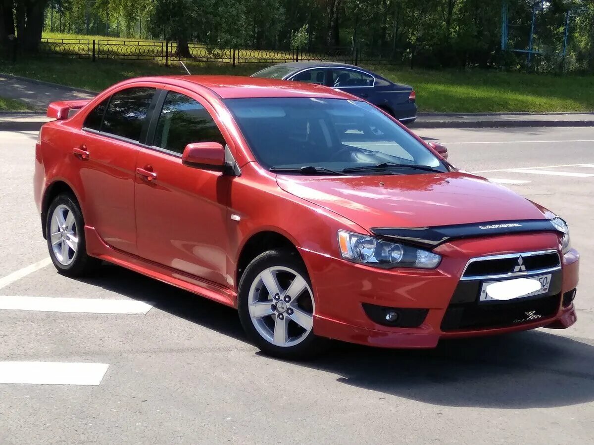 Купить лансер в московской области. Митсубиси Лансер 10. Mitsubishi Lancer 10 дорестайлинг. Лансер 10 Рестайлинг. Митсубиси Лансер 10 красный Рестайлинг.