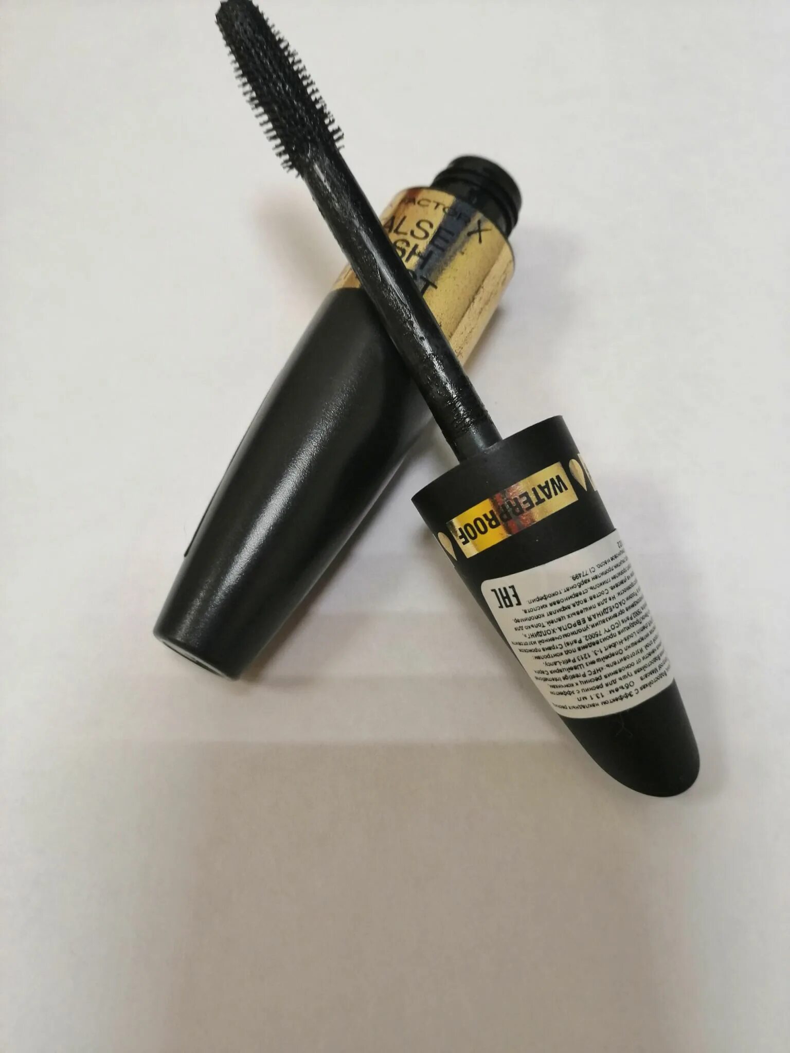 Max factor lash effect отзывы. Тушь max factor false lash effect. max factor voluptuous false lash effect кисточка. max factor false lash effect natural look. max factor тушь false lash effect black.