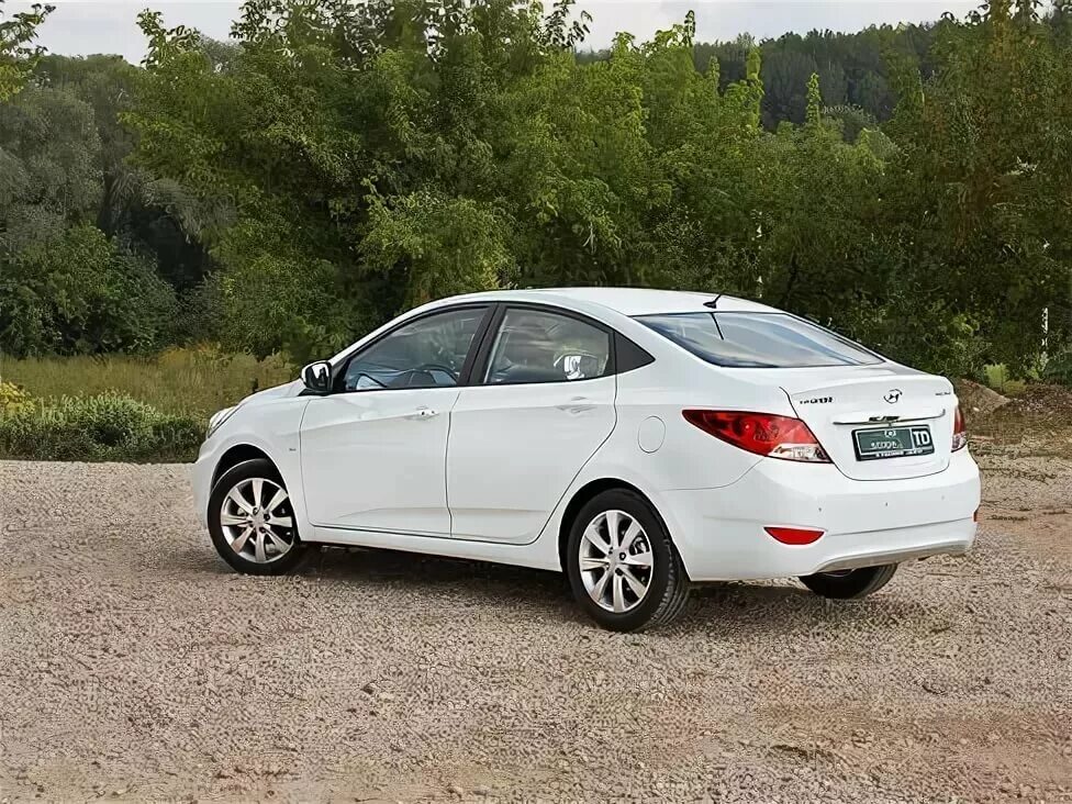 Хендай солярис 2012 1.4. Hyundai Solaris 2013 седан. Хендай Солярис 2012 белый. Хендай Солярис 2013 белый седан. Хендай Солярис 2012 седан.