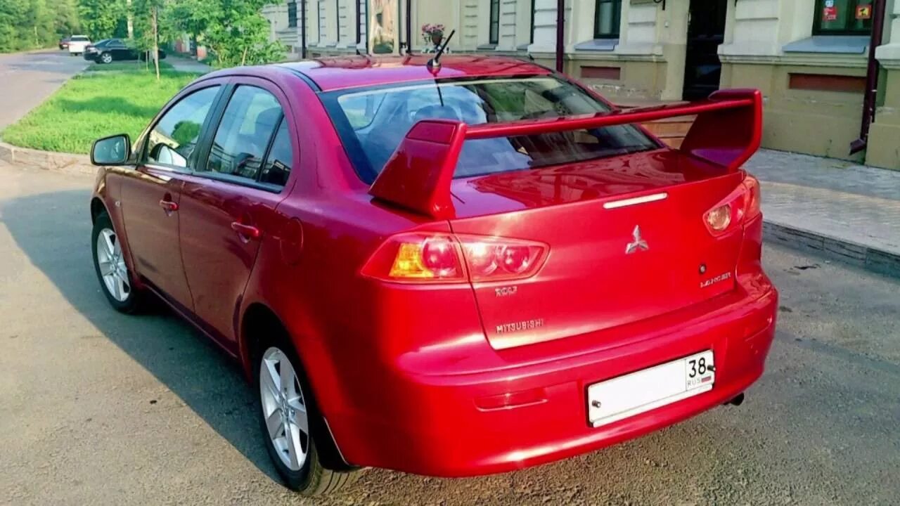 Спойлер на митсубиси лансер. Mitsubishi Lancer 10 спойлер. Митсубиси Лансер 10 красный со спойлером. Mitsubishi Lancer 10 EVO спойлер. Эво спойлер Лансер 10.