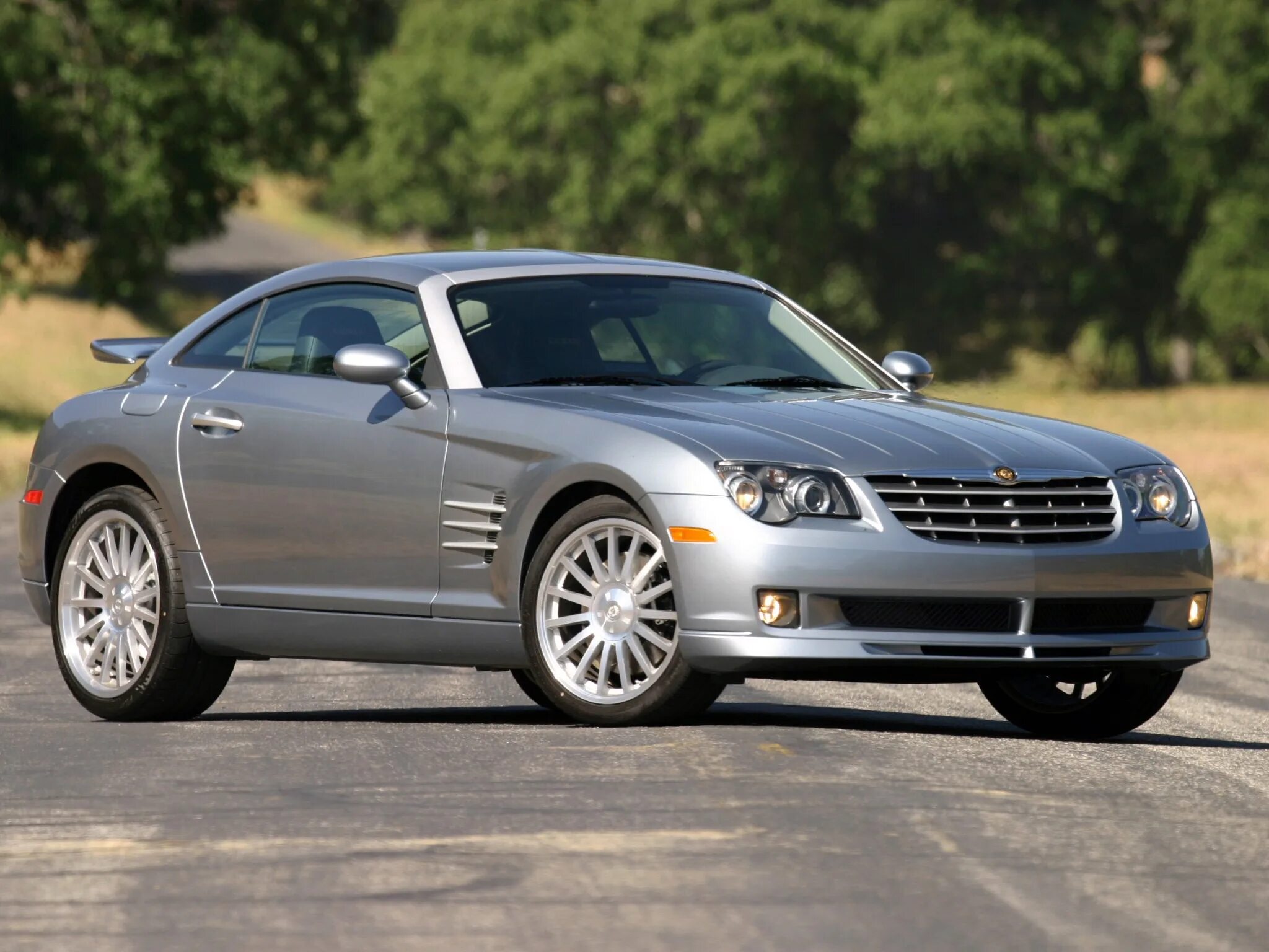 Американская машина крайслер. Chrysler Crossfire 2004. Крайслер c80. Крайслер Crossfire. Chrysler Crossfire srt.