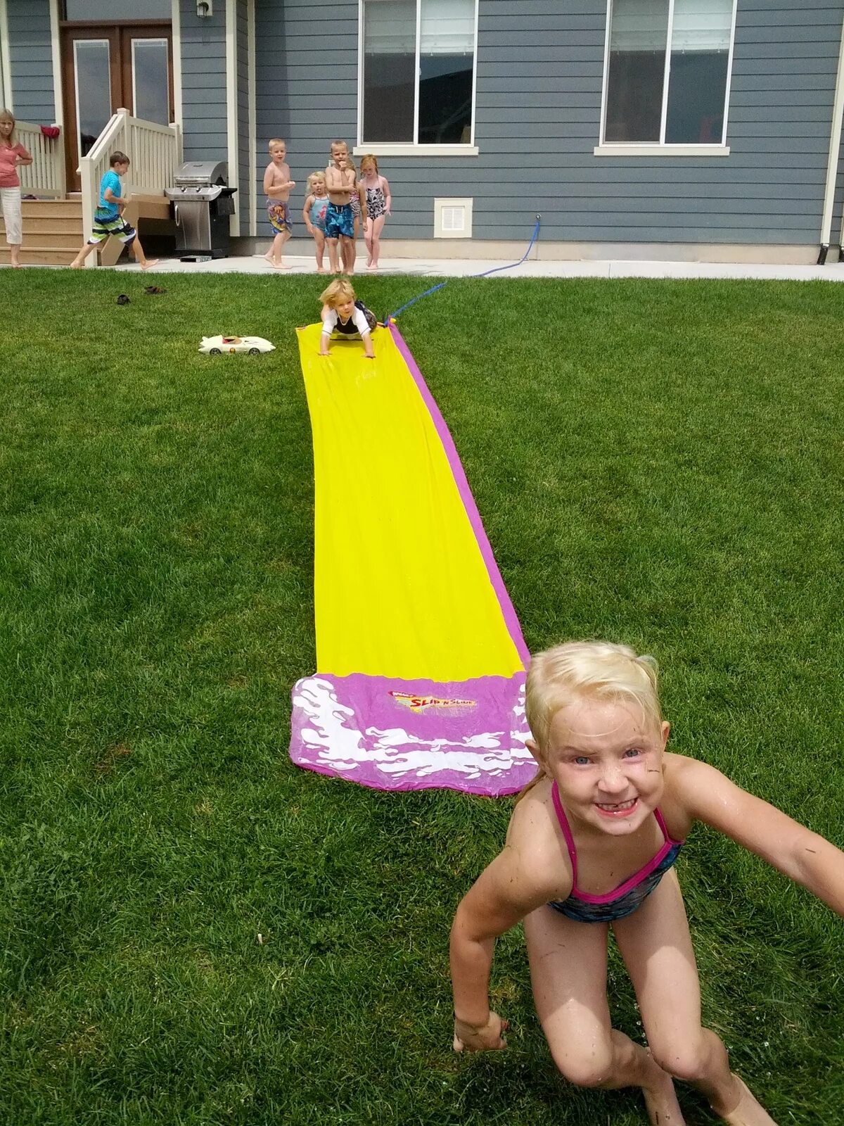 Slip n sliding. Water slide. slip n slide wedgie. children wedgie. pov slip n slide.