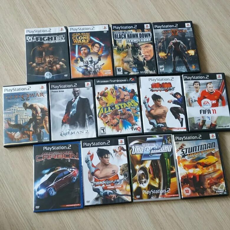 Sony playstation 2 диски. Диски на плейстейшен 2. Диски для приставки сони плейстейшен 2. Диск ps2 Иваново. Диск плейстейшен 2 русская версия.