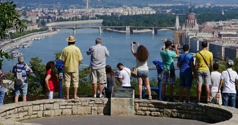 Tourists come