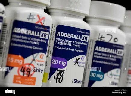 Bottles of Adderall XR prescription pharmaceuticals photographed in a pharm...