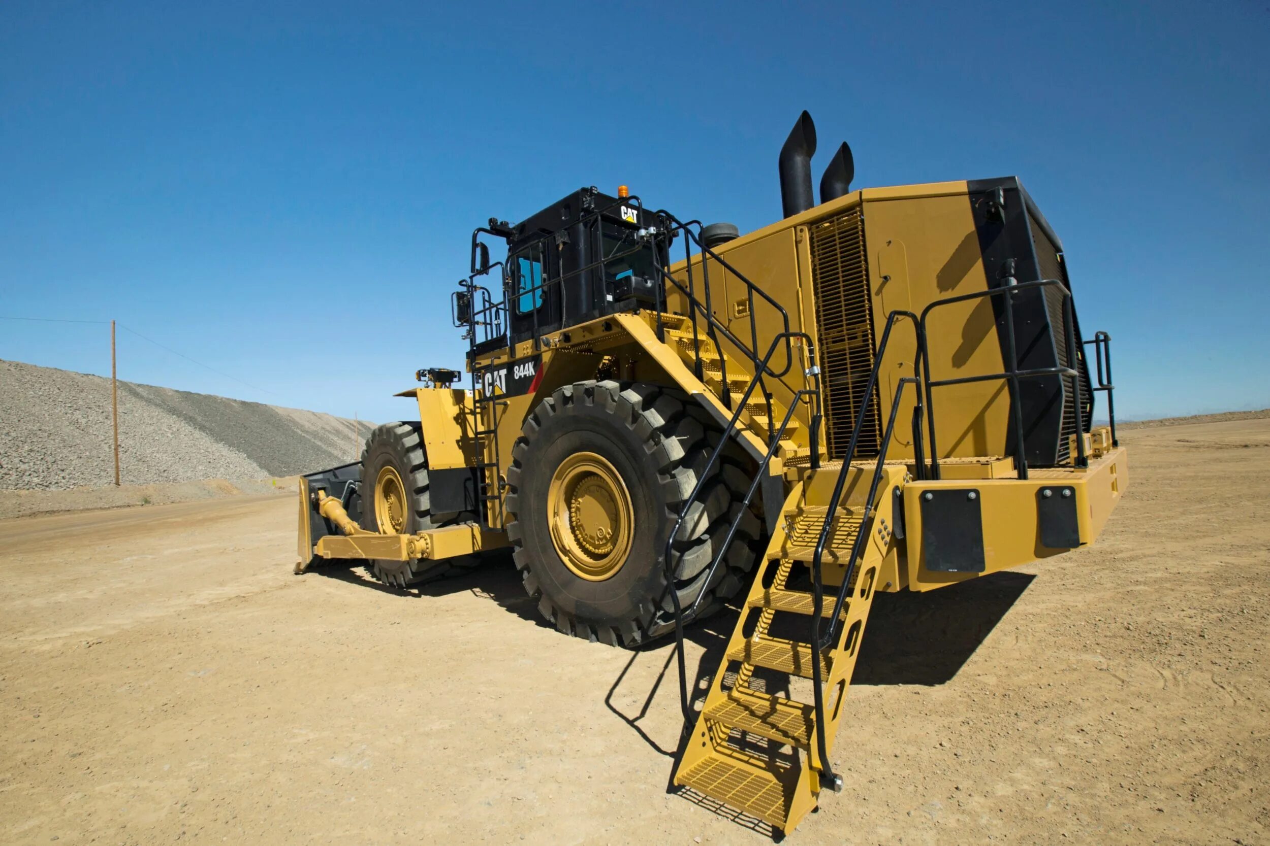 бульдозер на колесах. бульдозер на колесах. бульдозер caterpillar 814. белаз 7823. бульдозер xcmg dl900a.