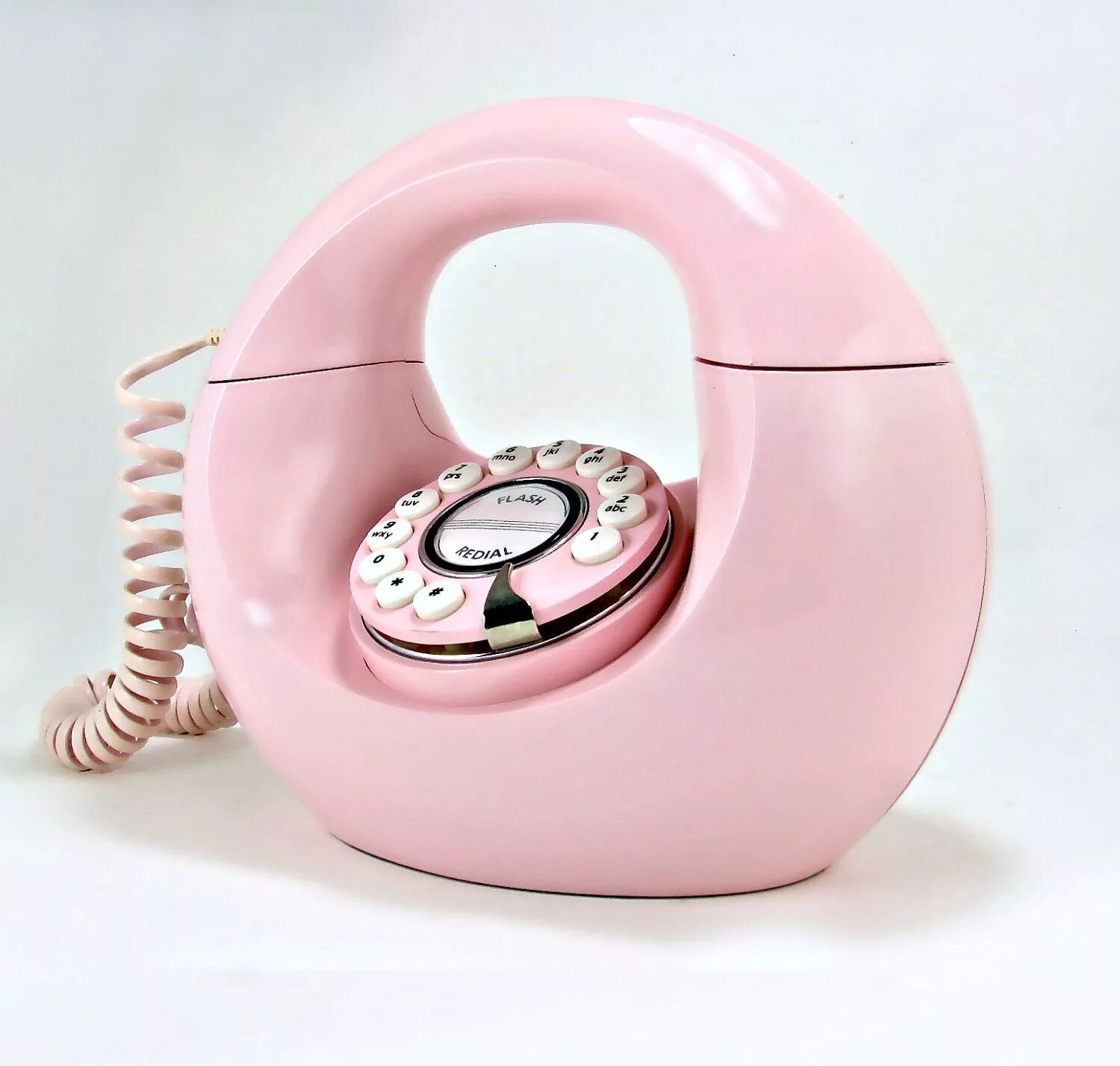 Розовый телефон фото. Розовый мобильник. Домашний телефон розовый. Радиотелефон в стиле ретро. Розовые смартфоны старые.