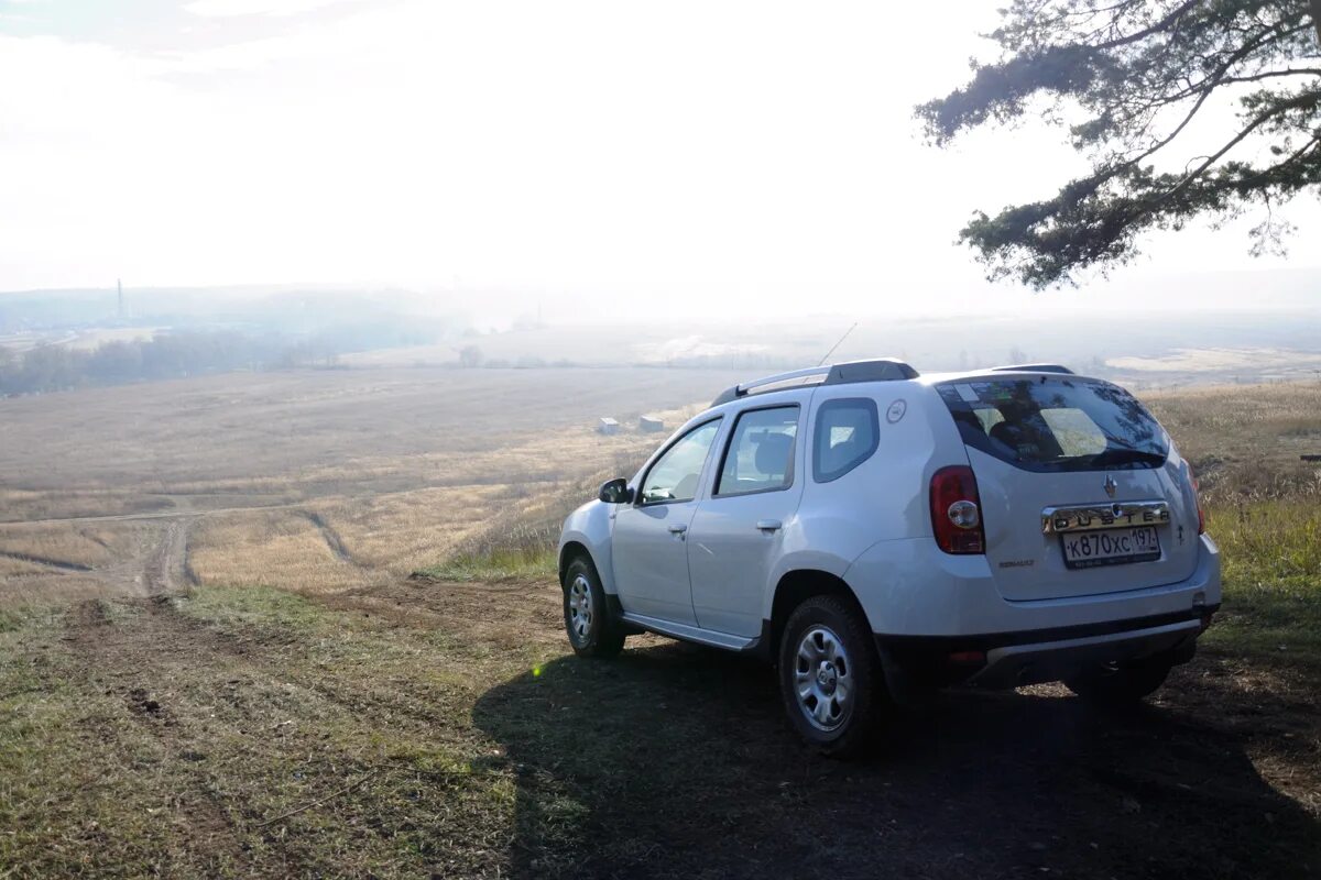 Renault Duster белый 2014.