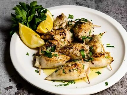 Кальмары фаршированные грибами и сыром в духовке