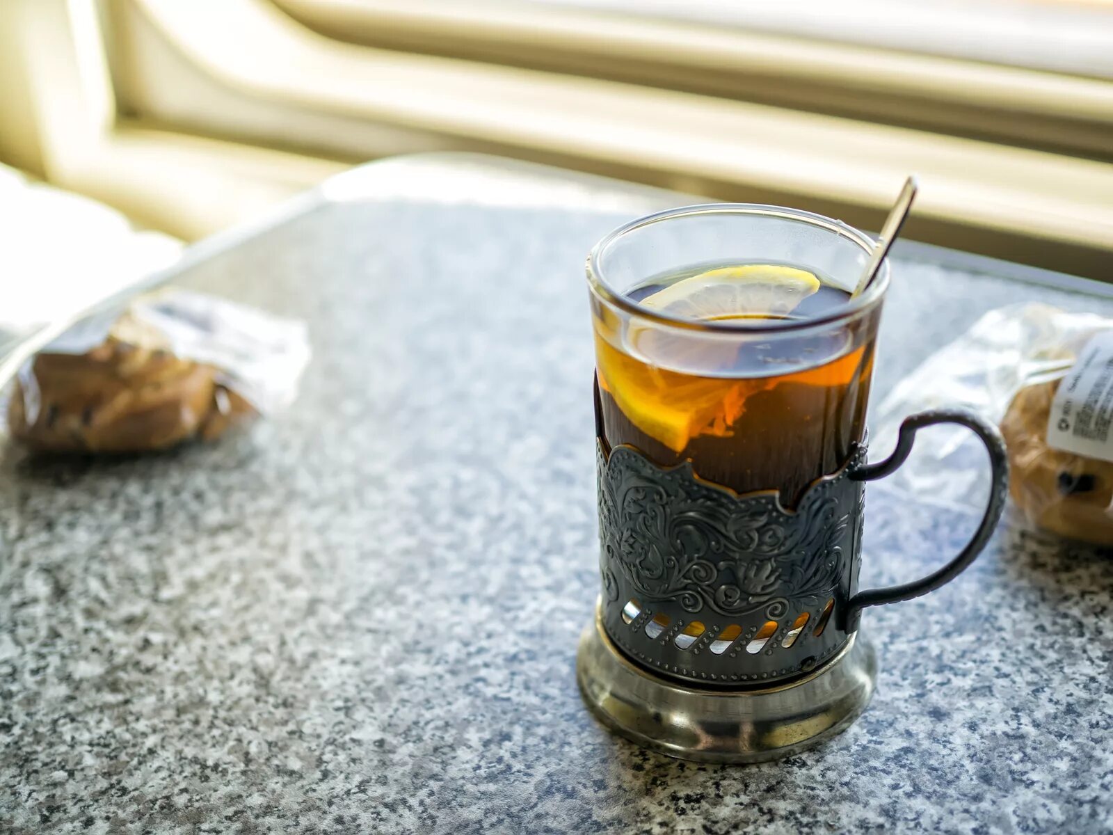 Чай со стаканом. Чай в подстаканнике. Чай в подстаканнике в поезде. Чай в стакане. Чай в стакане с подстаканником.