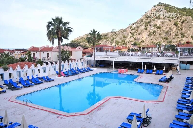 Akdeniz beach hotel. Отель Карбель Олюдениз. Karbel Beach 3 Турция Олюдениз. Karbel Hotel Oludeniz фото. Karbel Hotel пляж.