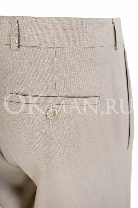 прорезной карман обманка с листочкой на брюках. карман на мужских брюках сзади. прорезной карман с листочкой. карман с листочкой на брюках сзади. листочка кармана.