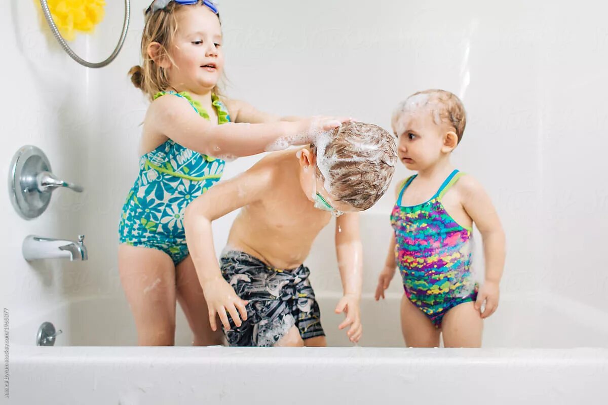 Siblings in the Bath. My sister swimming