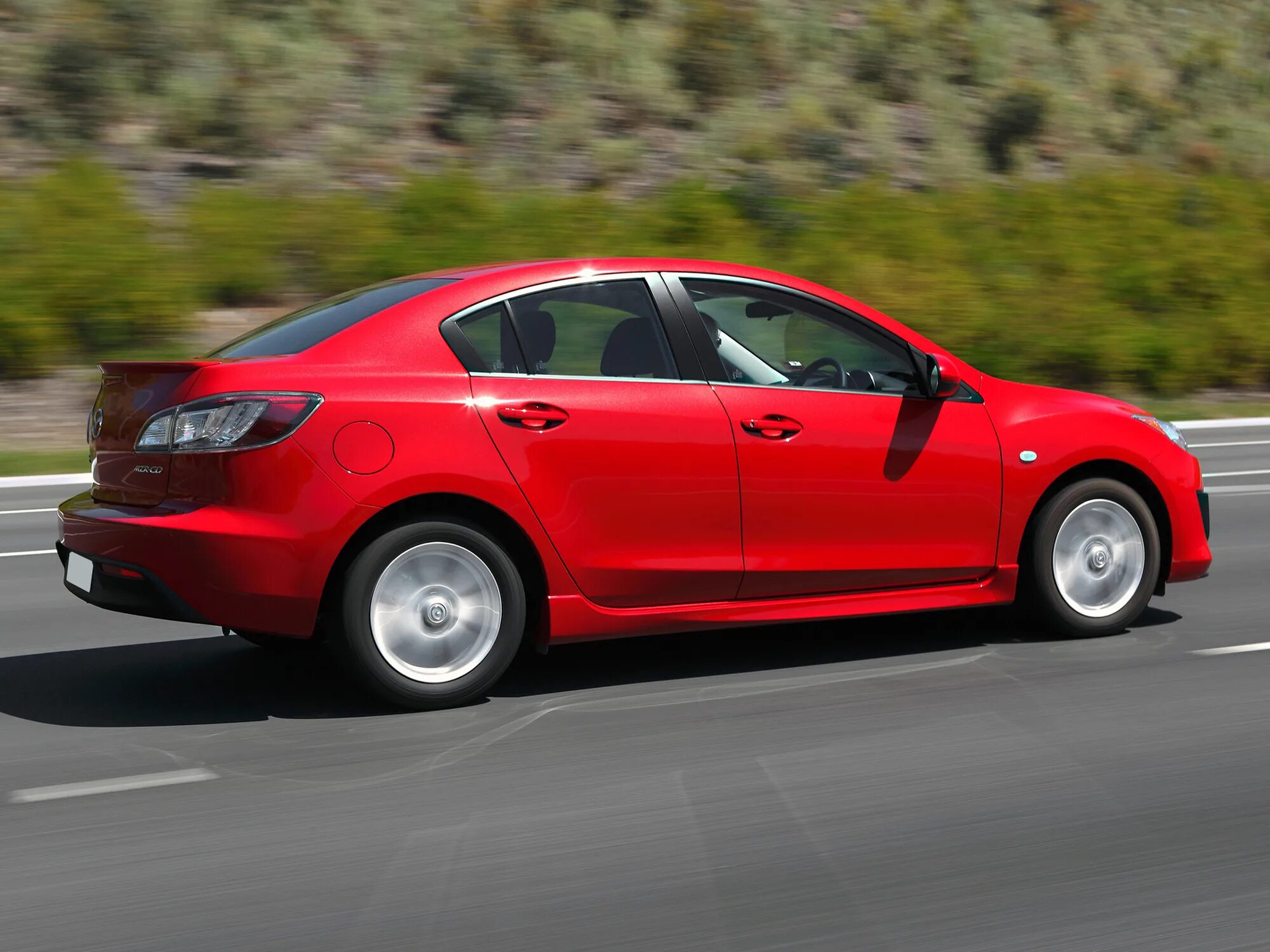Mazda 11. Мазда 3 седан 2009. Мазда 3 2 поколение седан. Мазда 3 3 поколение. Мазда 3 2009 красная.