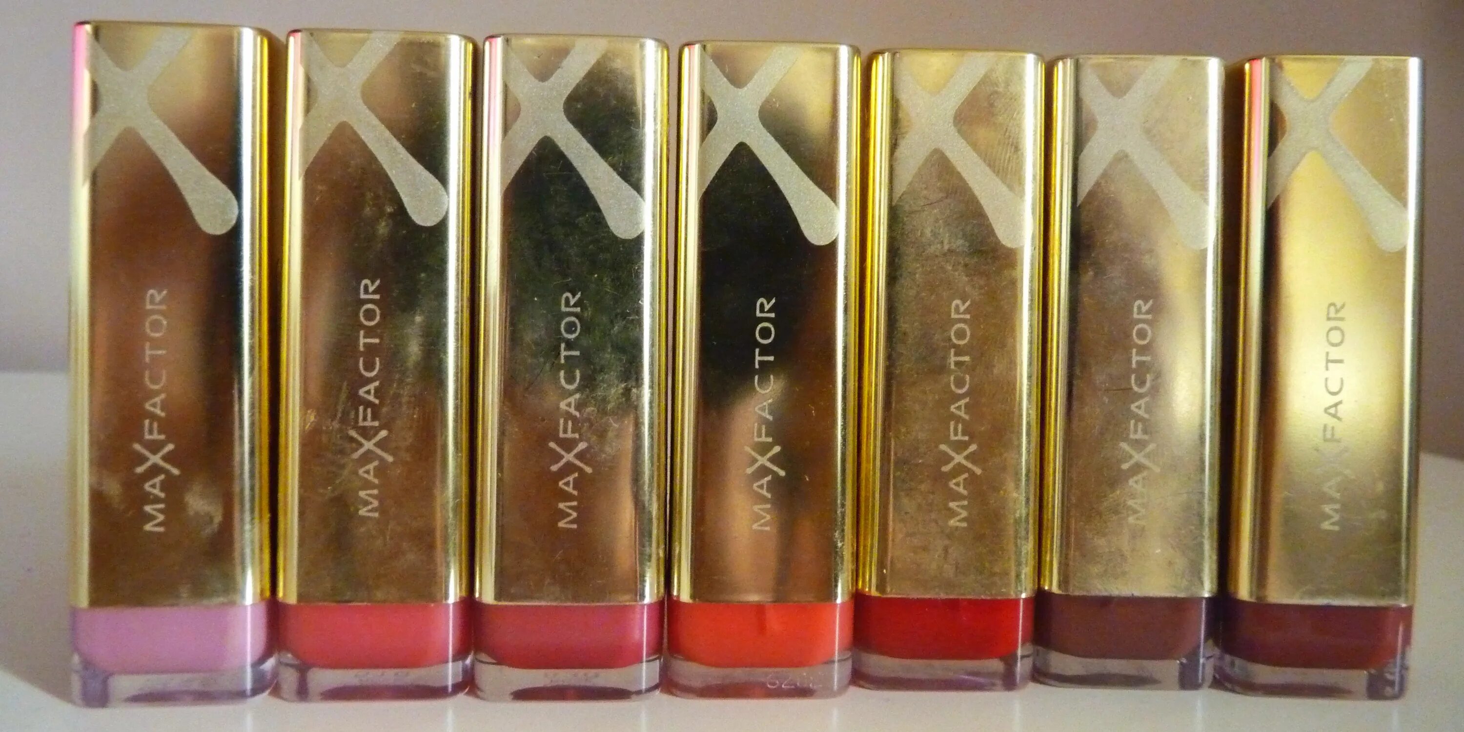 Max elixir. Max factor colour elixir 090. max factor colour elixir палитра. max factor губная помада colour elixir. max factor colour elixir цвета.