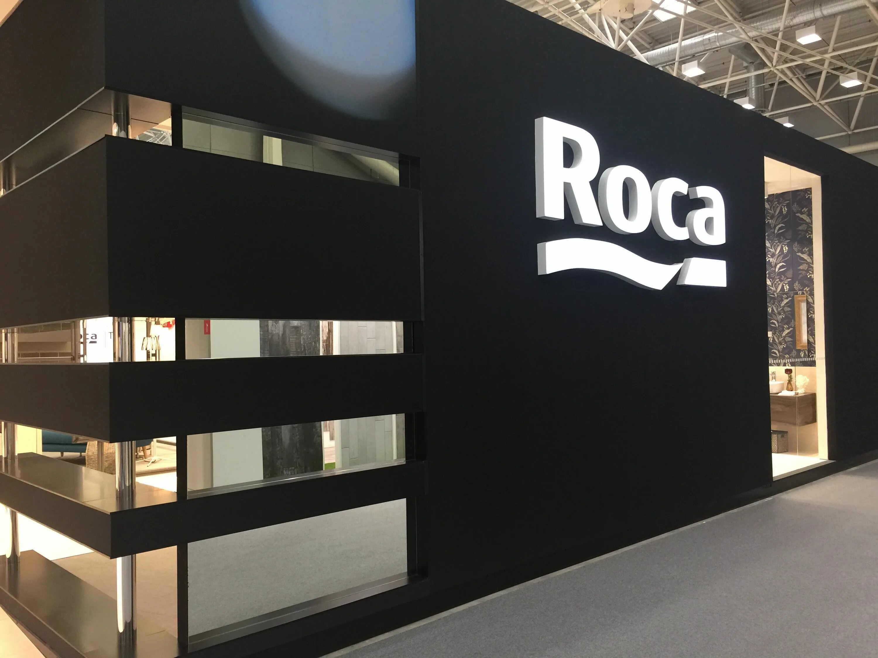 Am group design. Roca group logo. roca group компании испании. roca логотип на мебели. бренд секция.