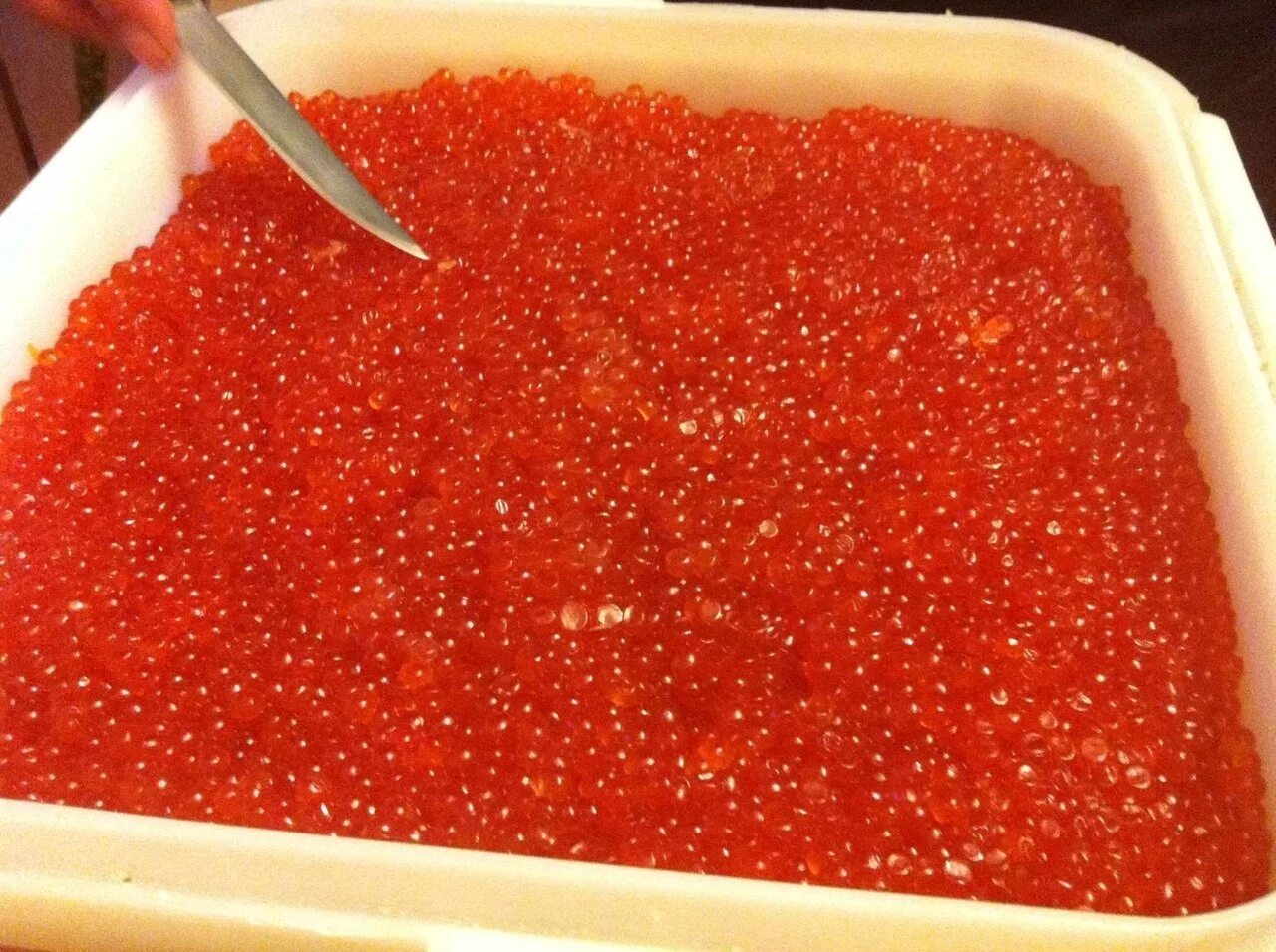Красная икра много