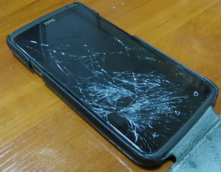 Разбитый смартфон. Сломанный смартфон. Разбитые телефоны. Разбитый дисплей.