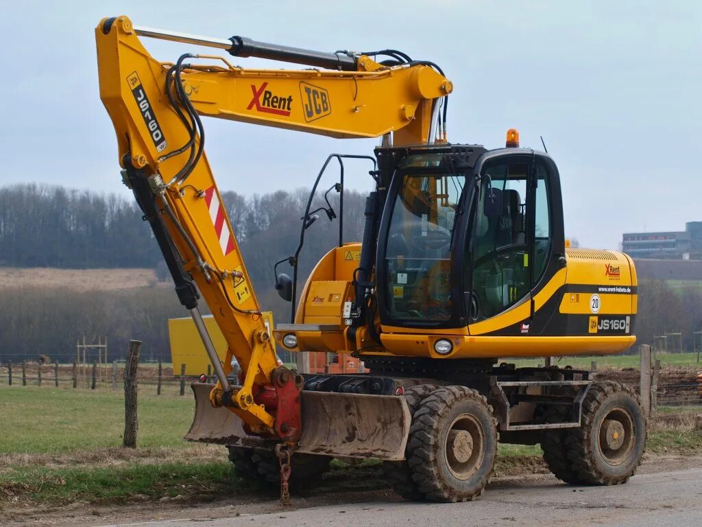 Экскаватор бу ру. Экскаватор JCB js160w. JCB 160 колесный экскаватор. Колесный полноповоротный экскаватор JCB js160w. Полноповоротный экскаватор JCB 160.