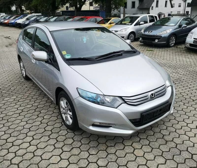 Ростов инсайт. Honda Insight 2010. Хонда Инсайт 2010 г. Honda Insight 2010г. Honda Insight 2010 белая.