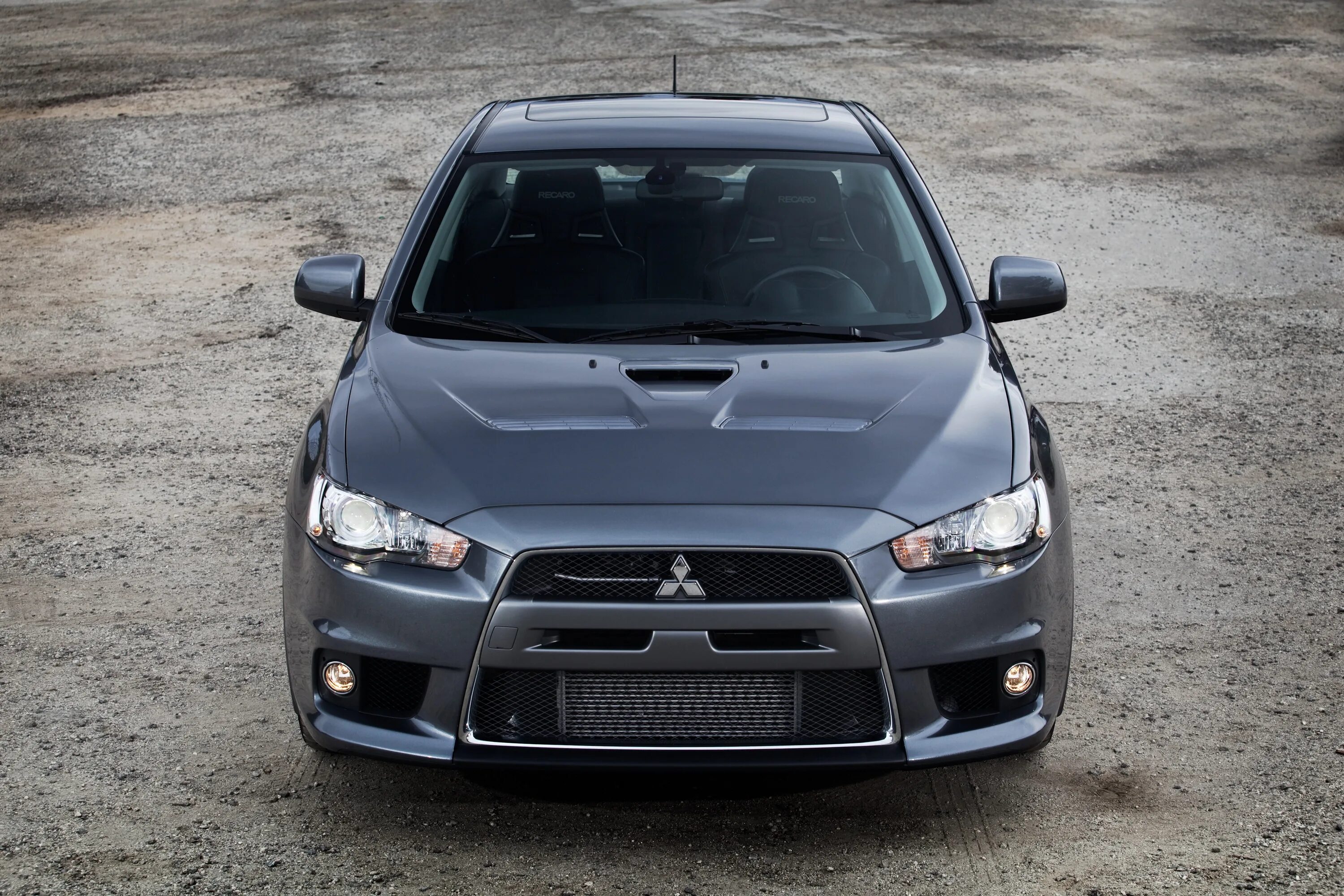 Mitsubishi lancer evolution 12. Митсубиси лансер эволюшн х. Мицубиси ланцер 10. Lancer evo 10. Лансер эво 10.