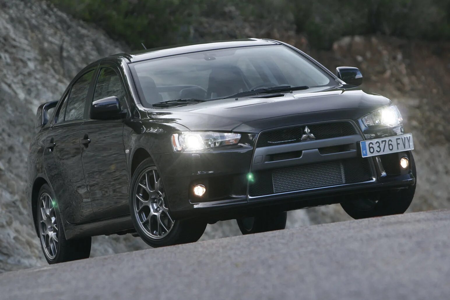 Митсубиси Лансер 10. Машина Митсубиси Лансер 10. Mitsubishi Lancer Evolution x 2012. Митсубиси ланцер Эволюшн 10.