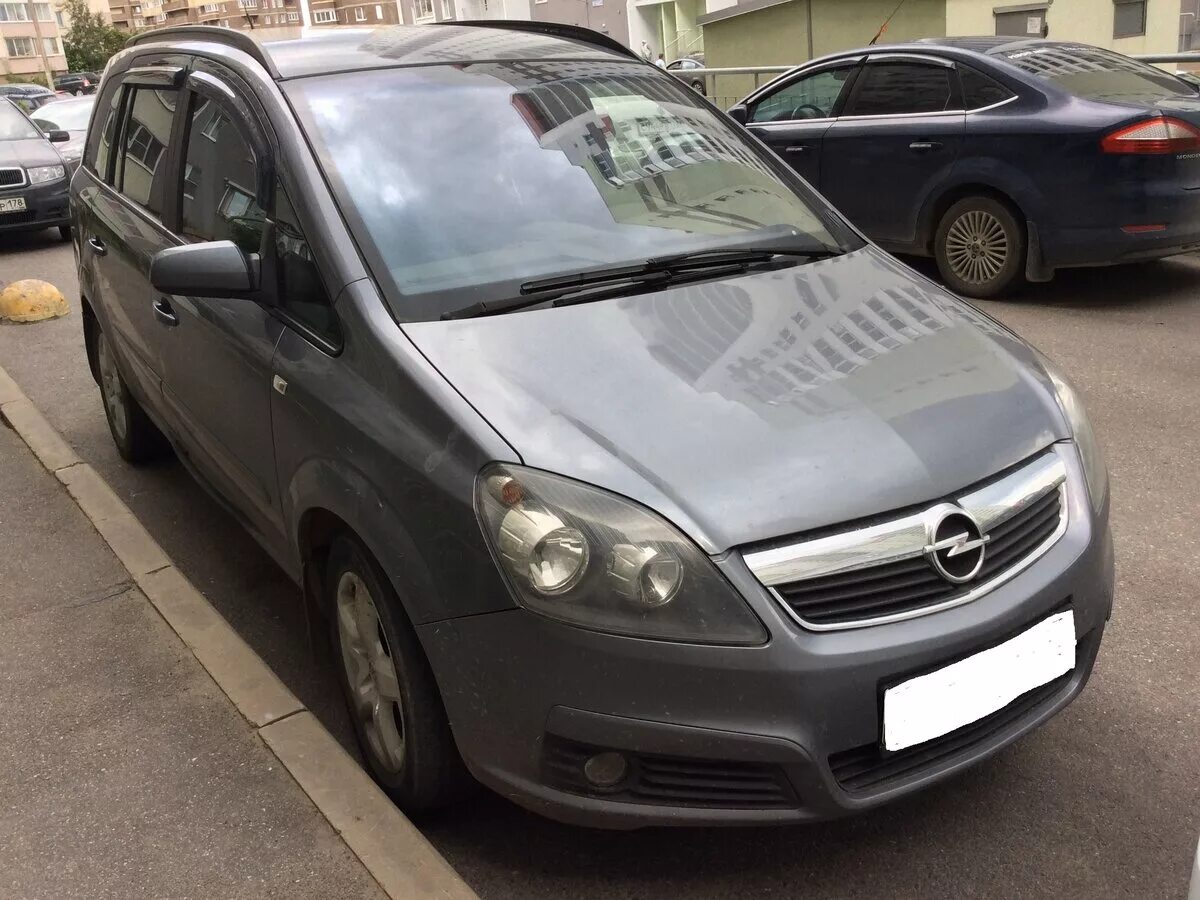 Зафира б года выпуска. Opel Zafira 2006. Zafira b 2006. Опель Зафира 2006г. Zafira b 2006 года.