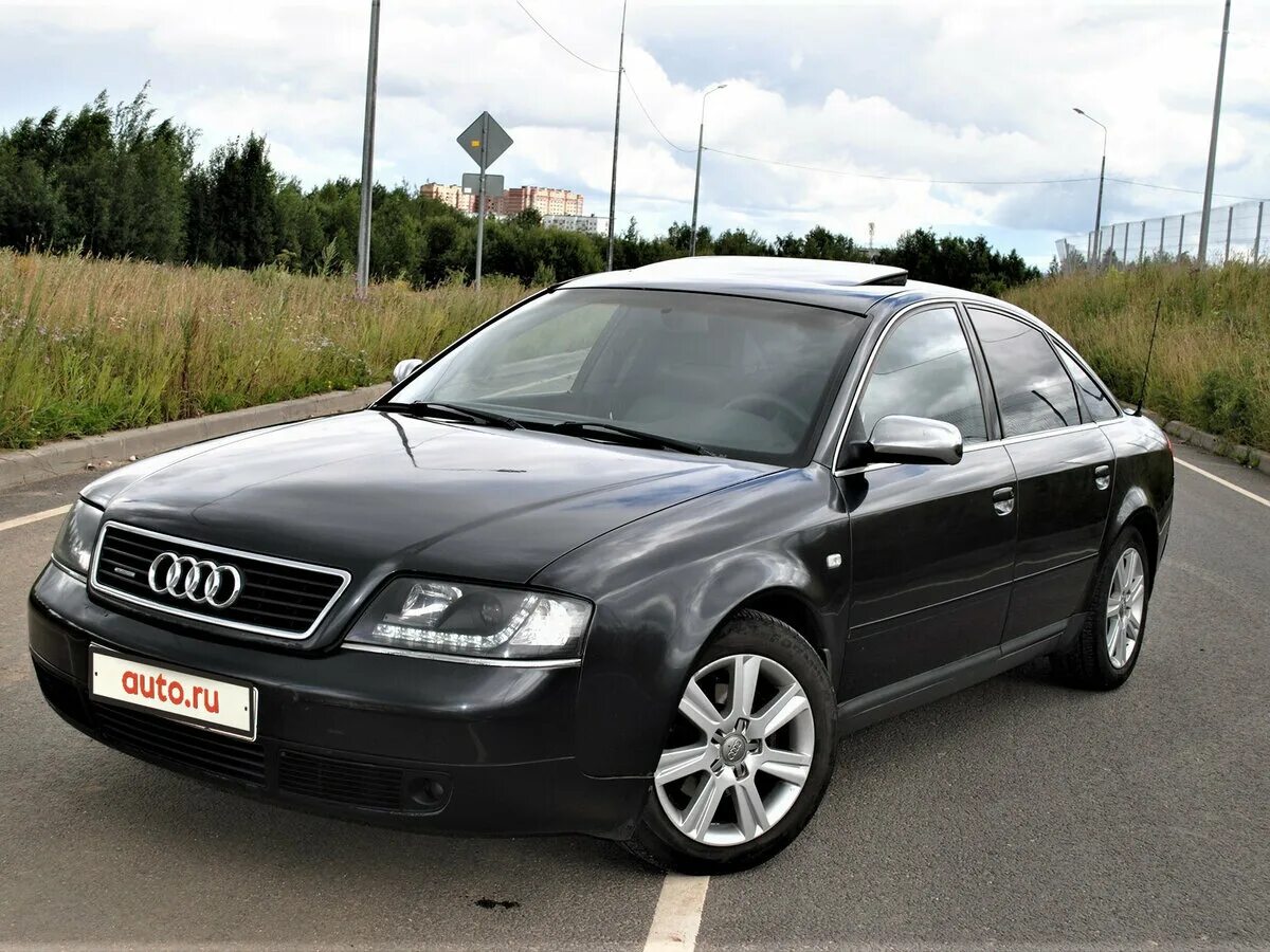 Купить ауди 1999. Audi a6 II (c5) 1999. Audi a6 c5 1999 года. Ауди 1999 года. Ауди a6 1999 года люди в черном.