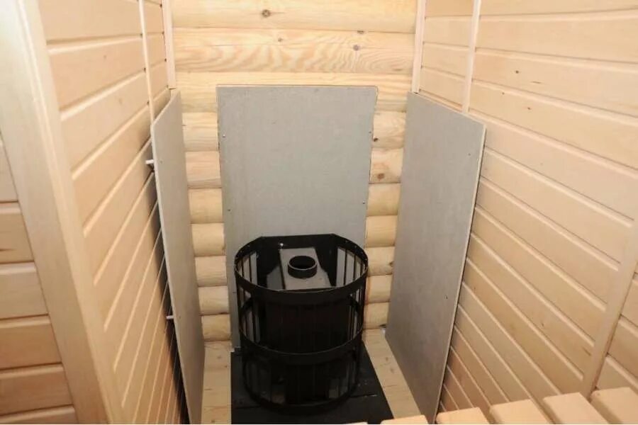 Печка в баню с предбанником. Печь в предбаннике. Печь для бани с топкой из предбанника. Печь стальмастер лайт с топкой из предбанника. Дровяная печь для бани с топкой из парилки.