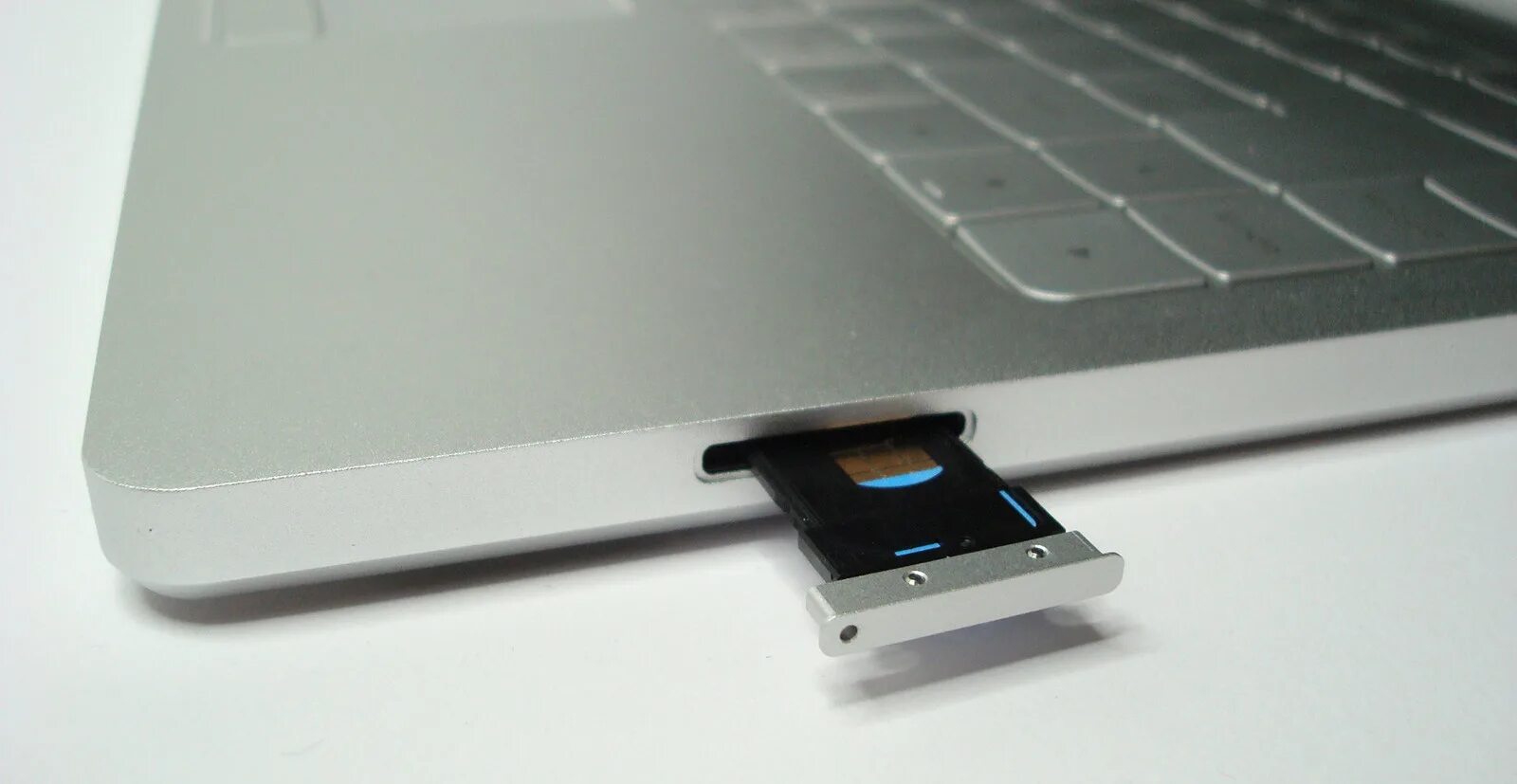 Как вставить симку в ноутбук. Модем для macbook air. симка в ноутбук для интернета. сим слот в ноутбуке. ноутбуки с сим картой для интернета.