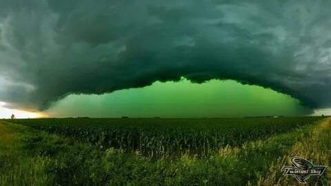 A storm tints the sky a vivid green near Sioux Falls, South Dakota, on July...