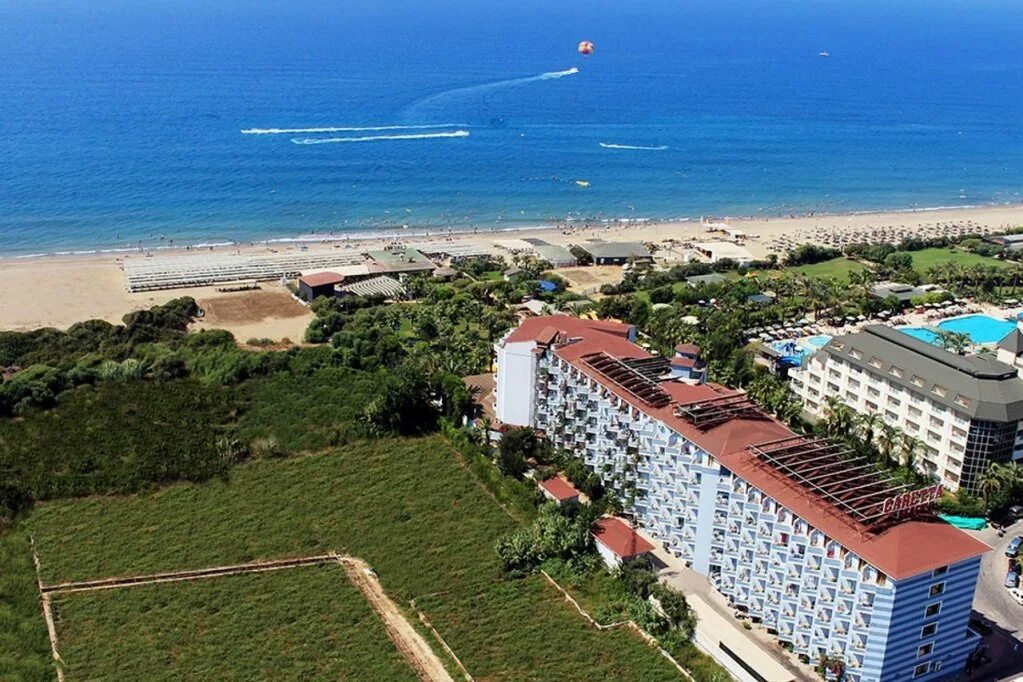 Caretta beach hotel турция аланья. Club Hotel Caretta Beach Алания Конаклы. Турция отель карета Бич 4 Алания. Caretta Beach Hotel 4 Турция. Club Hotel Caretta Beach 4* пляж.