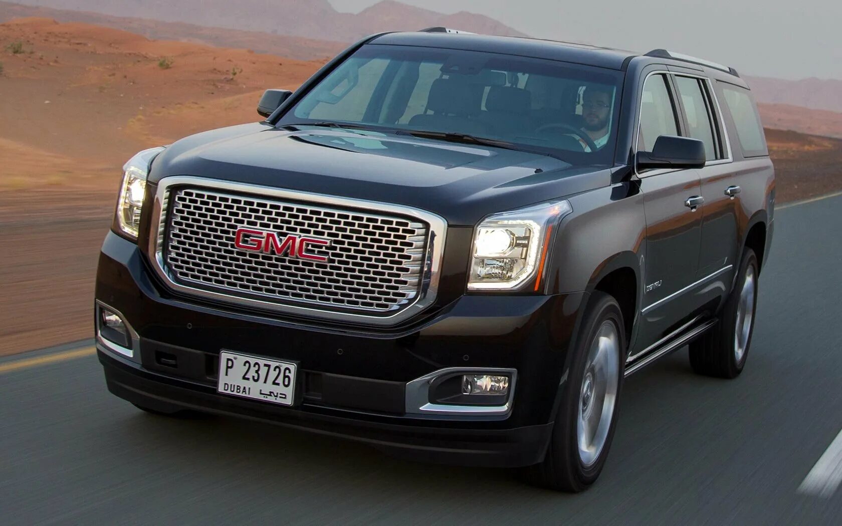 Джи эм ти. GMC Yukon XL Denali 2015. GMC Yukon 2014. GMC Yukon Denali 2014. Машина GMC Юкон.