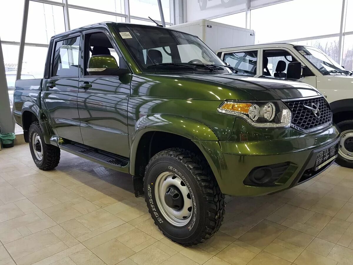 Купить уаз 2021. УАЗ Патриот Pickup 2021. УАЗ Патриот 2021 зеленый металлик. UAZ Patriot Pickup зеленый. УАЗ Патриот пикап 2021.