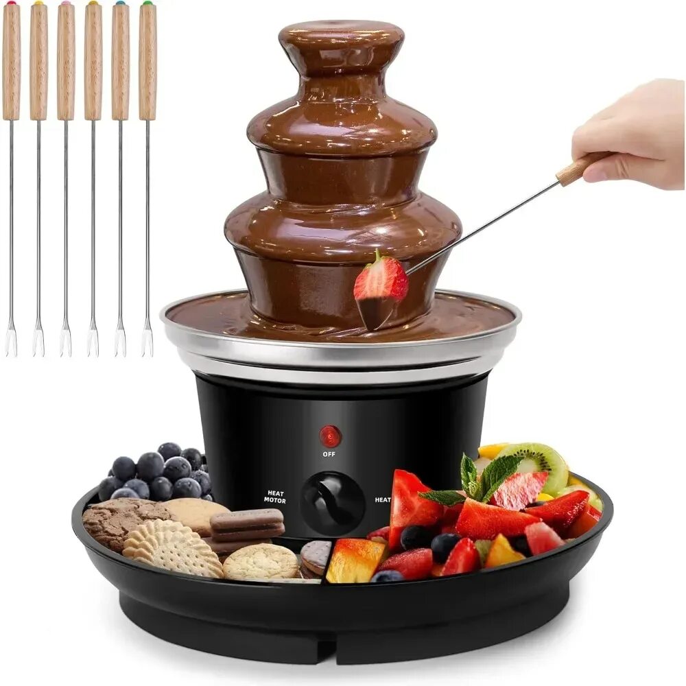Fondue fountain. Фондю фонтан. Электрофондю. Fondue fountain. Фонтан шоколадный фото на белом фоне.
