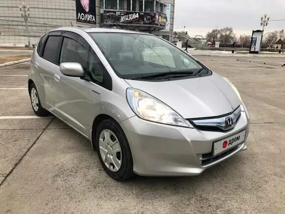 Хонда фит 2012г. Honda Fit 2012. Хонда фит гибрид 2012. Тойота фит 2012.