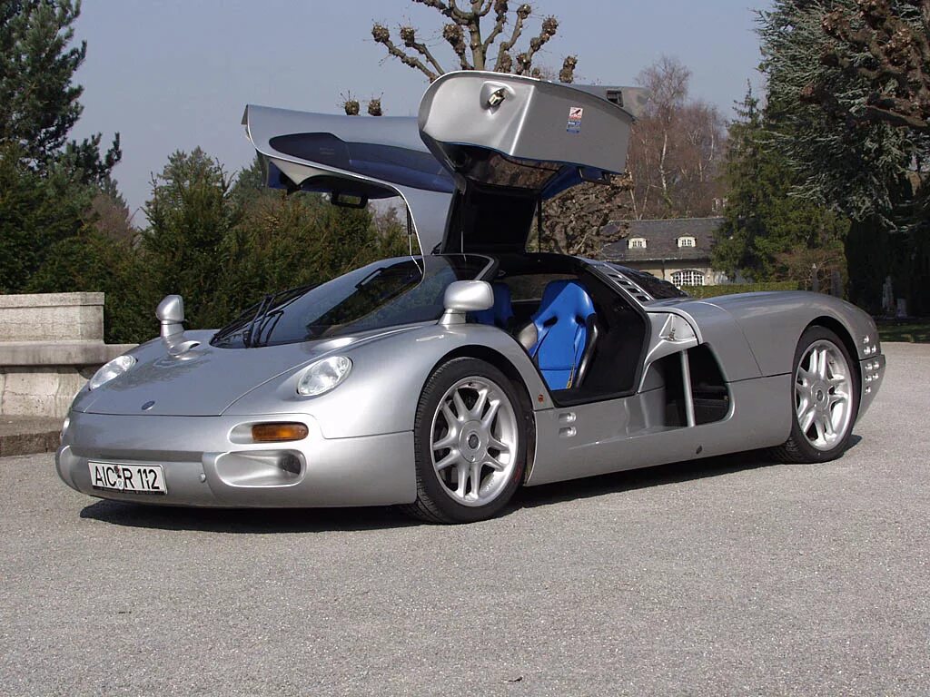 Какая редкая машина. Isdera 112i. Isdera Silver arrow c112i. Commendatore 112i. Isdera Imperator 108i Concept.