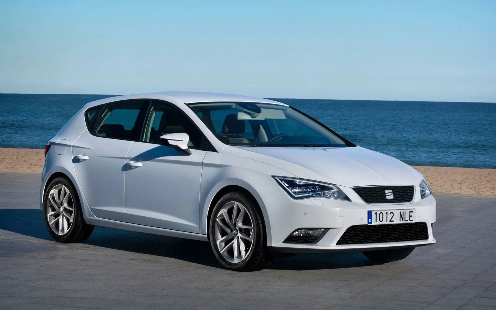 Сиат авто. Seat Leon 2013. Seat Leon 2022.