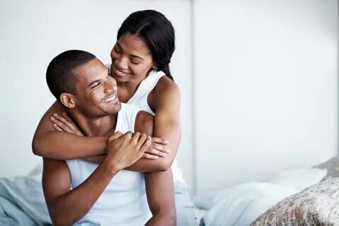 young-black-couple-cuddling-on-a-bed - Jibola Ajitena Therapy