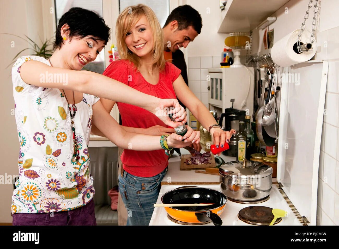 Friends in the Kitchen. Cooking together photo. Four friends Cooking together. Cooking together with boyfriend. Cooking for friends