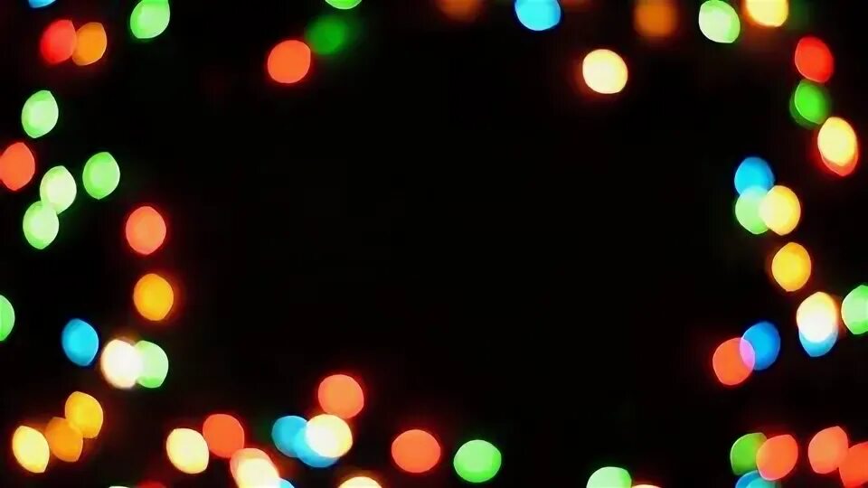 Новогодние огоньки. Блики на черном фоне. Боке на черном фоне. Огоньки. Новогоднее боке.