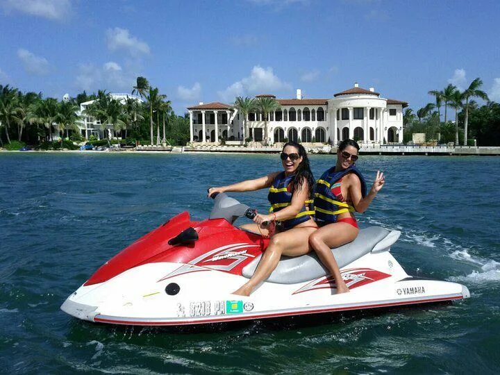 Laura can sail a jet ski. Jet ski car. car scooter in the water.