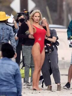 Lily James the Baywatch babe slips into Pamela Anderson’s iconic red swimsu...