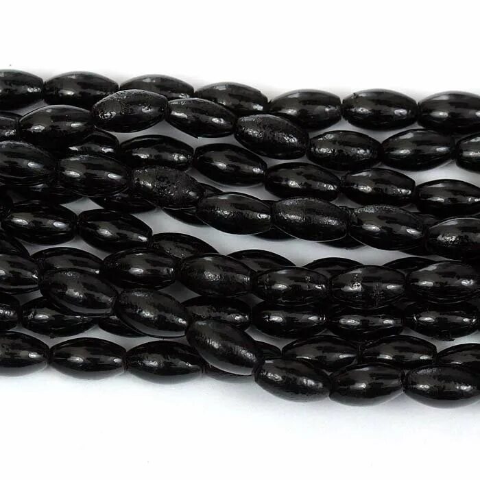 Черный окаменелый коралл. Натуральный чеерный корал. Бусины коралл рис. Бусы из черного коралла. Черные кораллы аккабар.